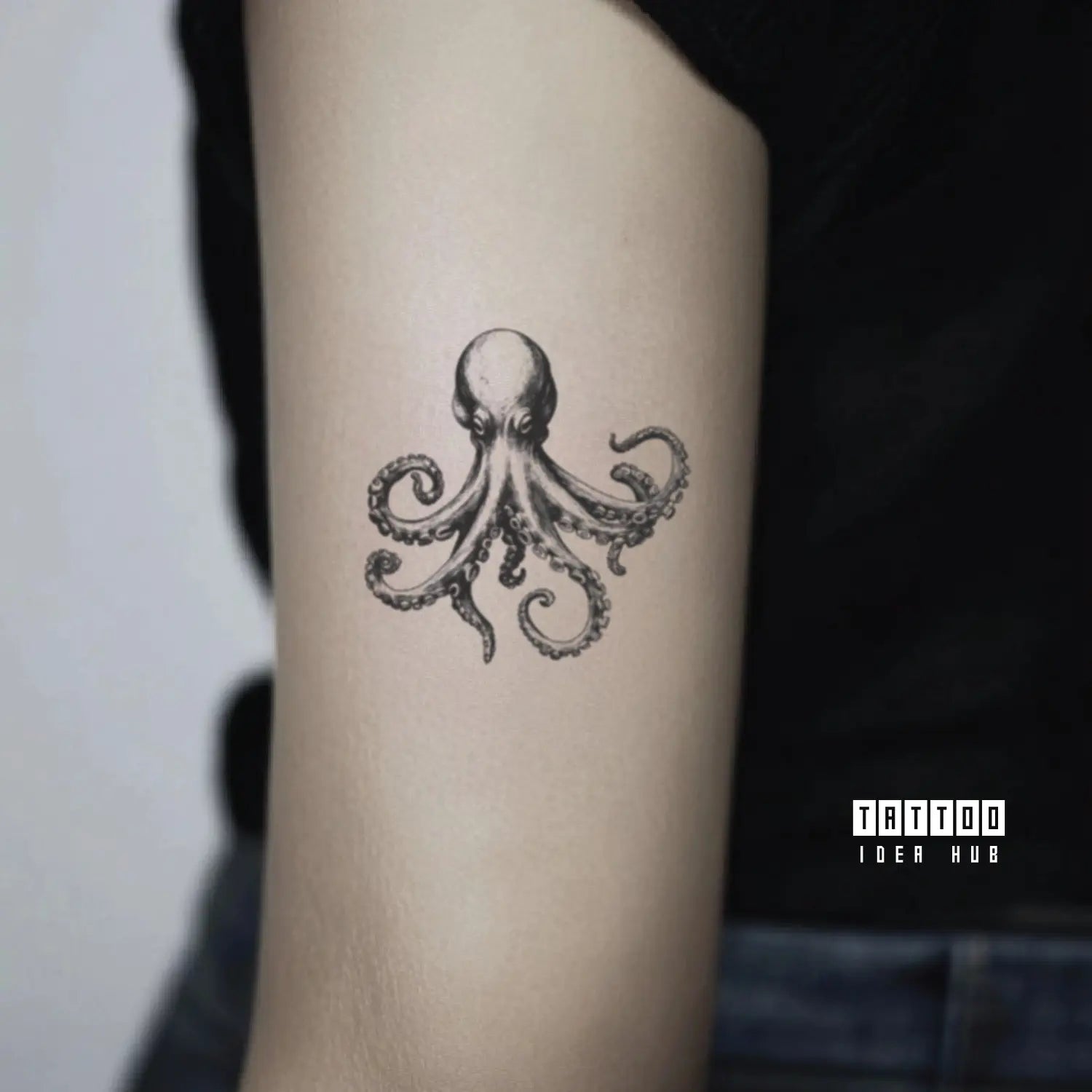 simple octopus bicep temporary tattoo idea design