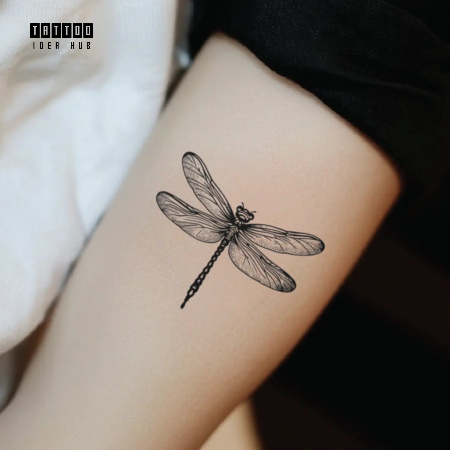 black and white dragonfly forearm temporary tattoo idea design