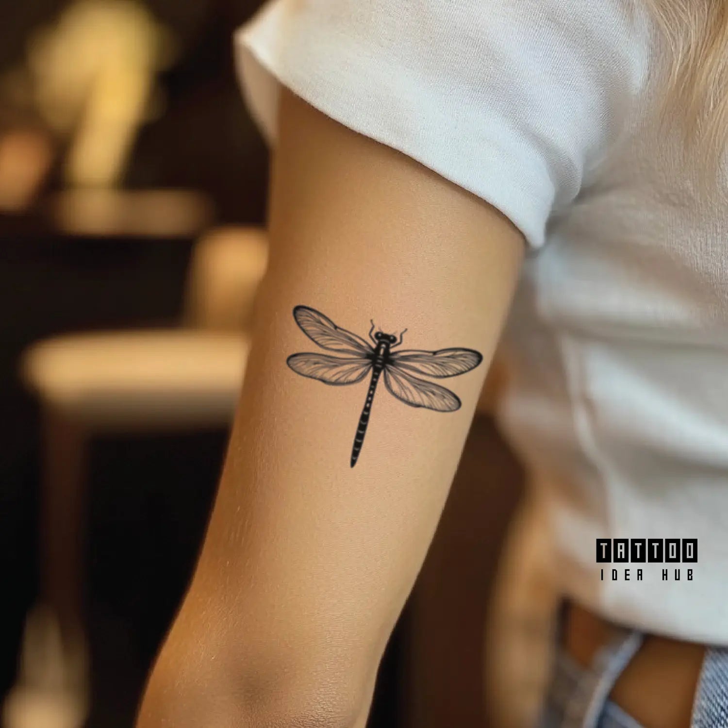 fine line dragonfly bicep temporary tattoo idea design