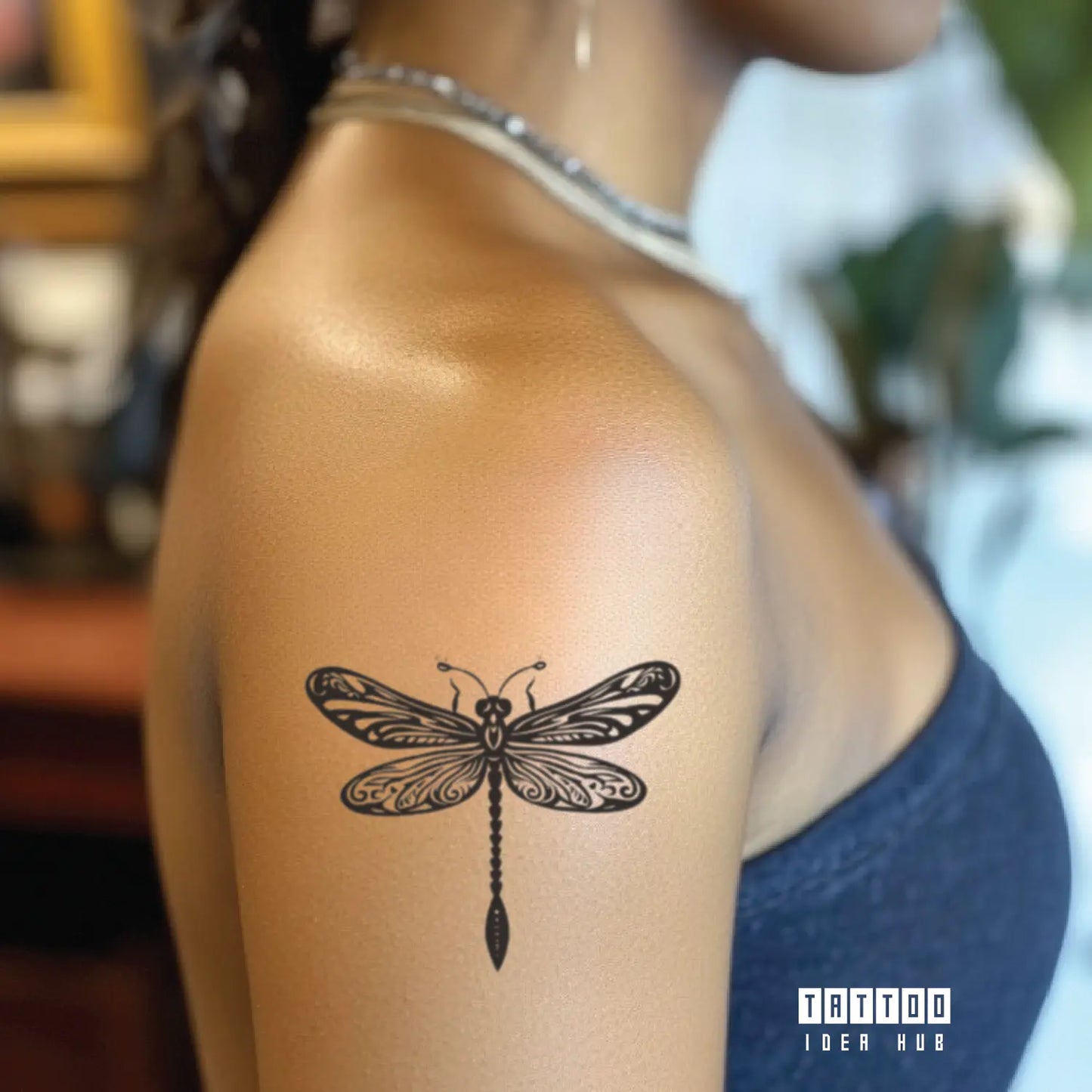 tribal dragonfly bicep temporary tattoo idea design