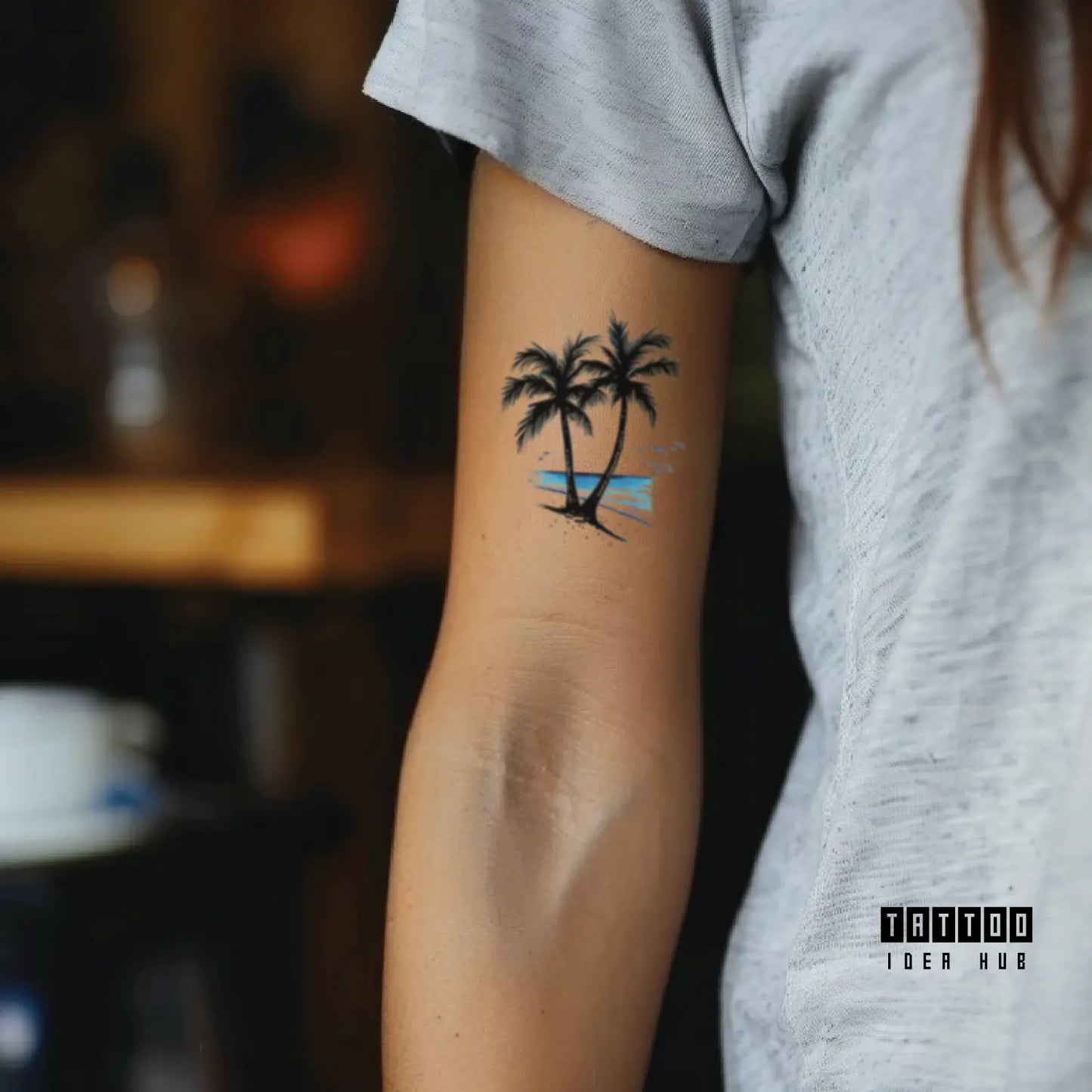 palm tree beach bicep temporary tattoo idea design