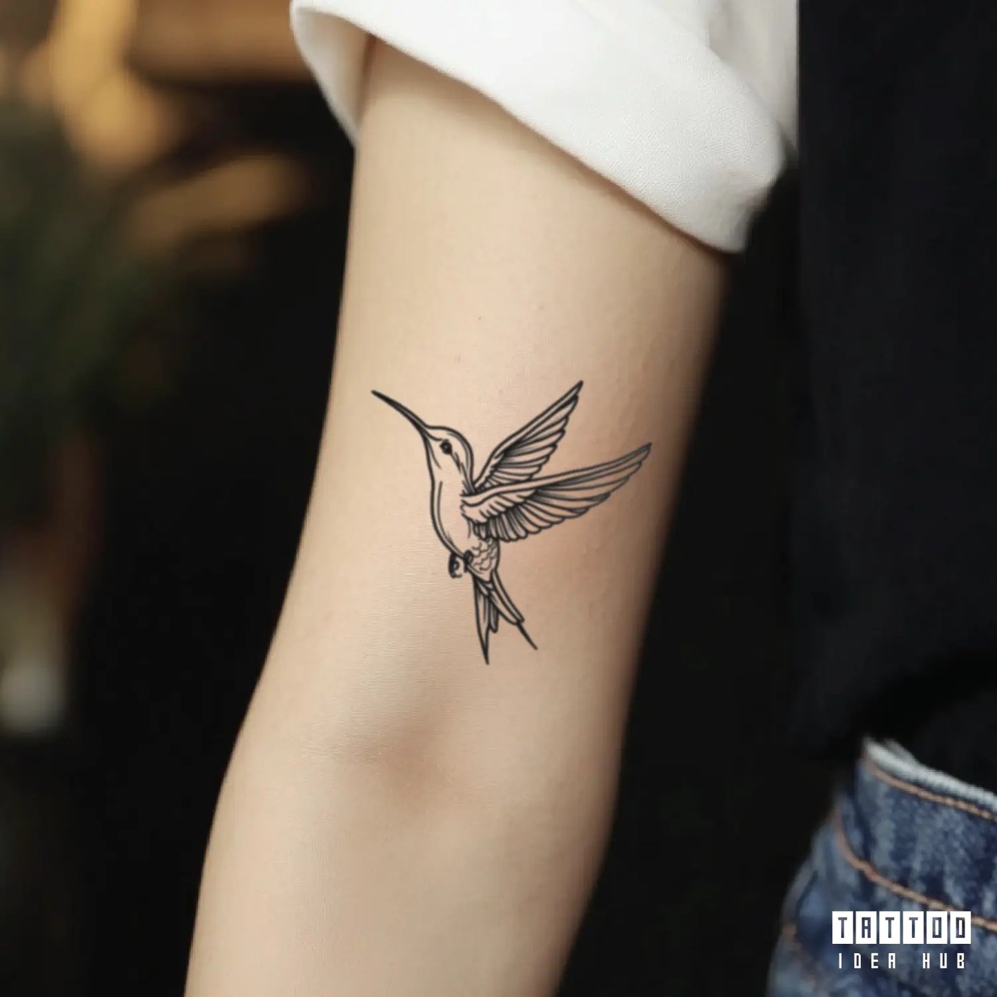 hummingbird outline bicep temporary tattoo idea design