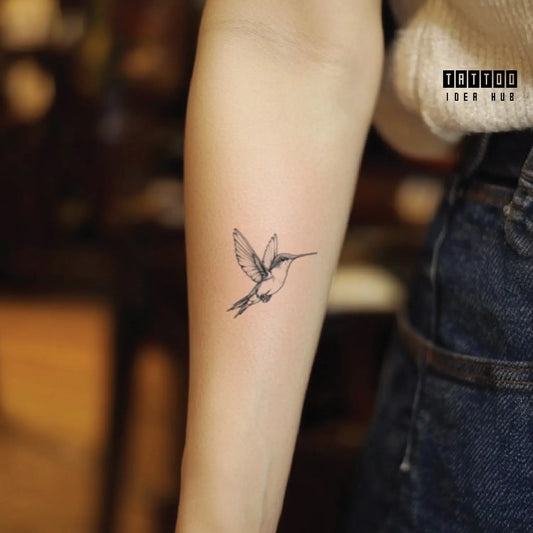 small hummingbird forearm temporary tattoo idea design