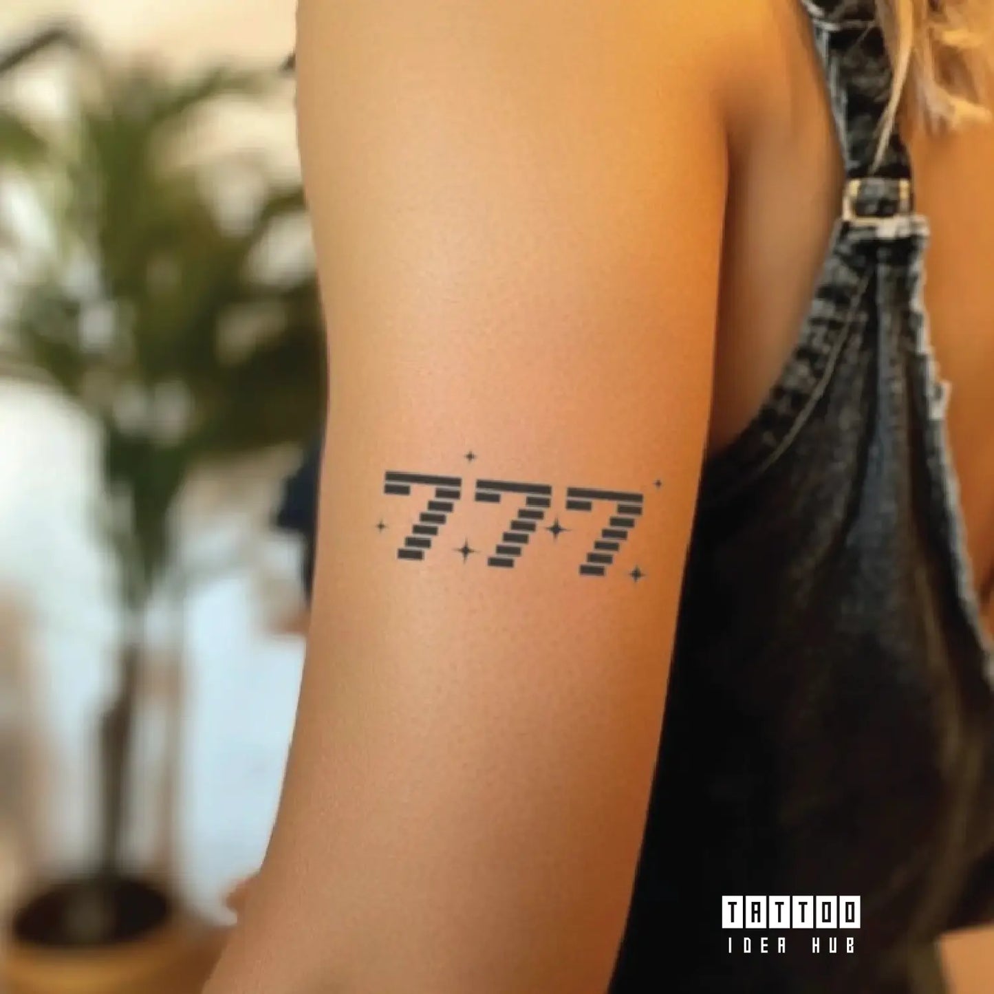 777 angel number bicep temporary tattoo idea design