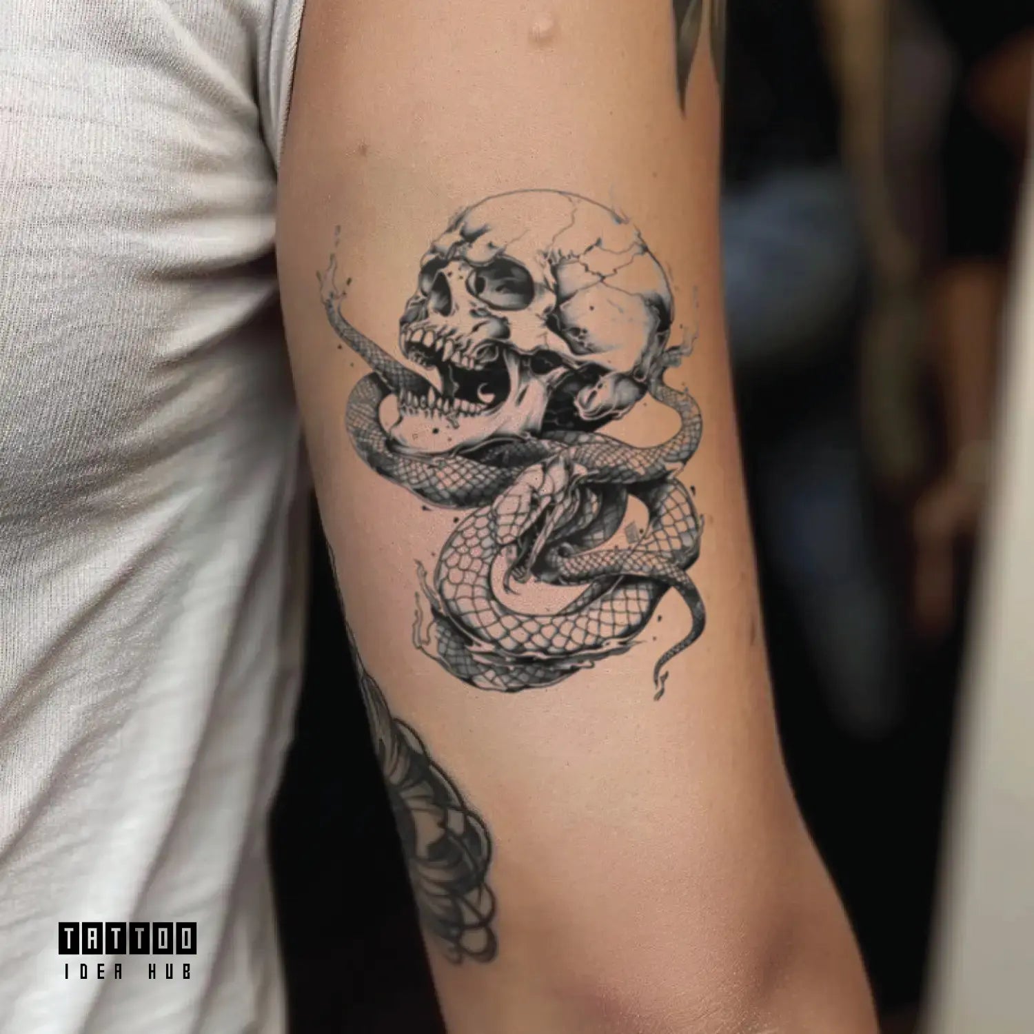 skull snake bicep temporary tattoo idea design