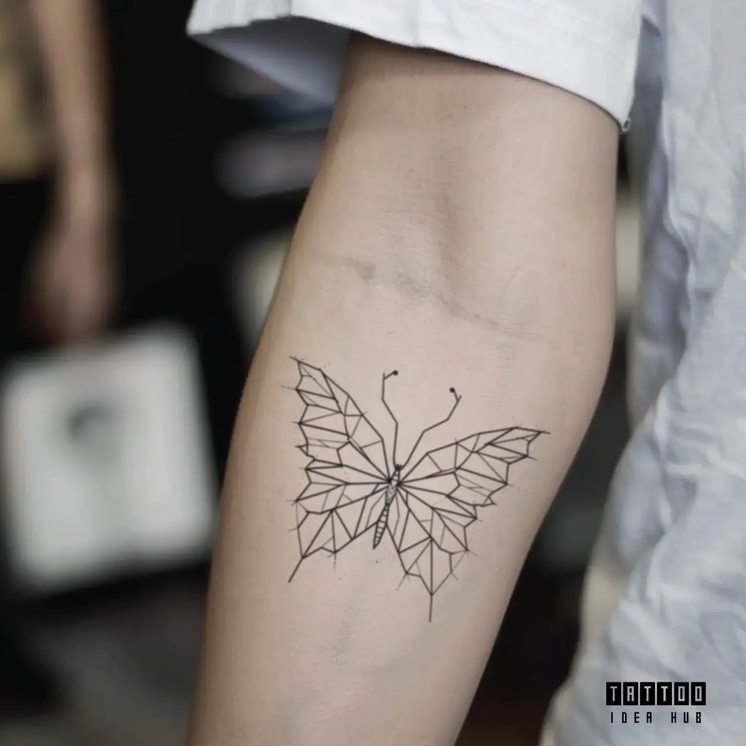 geometric butterfly forearm temporary tattoo idea design