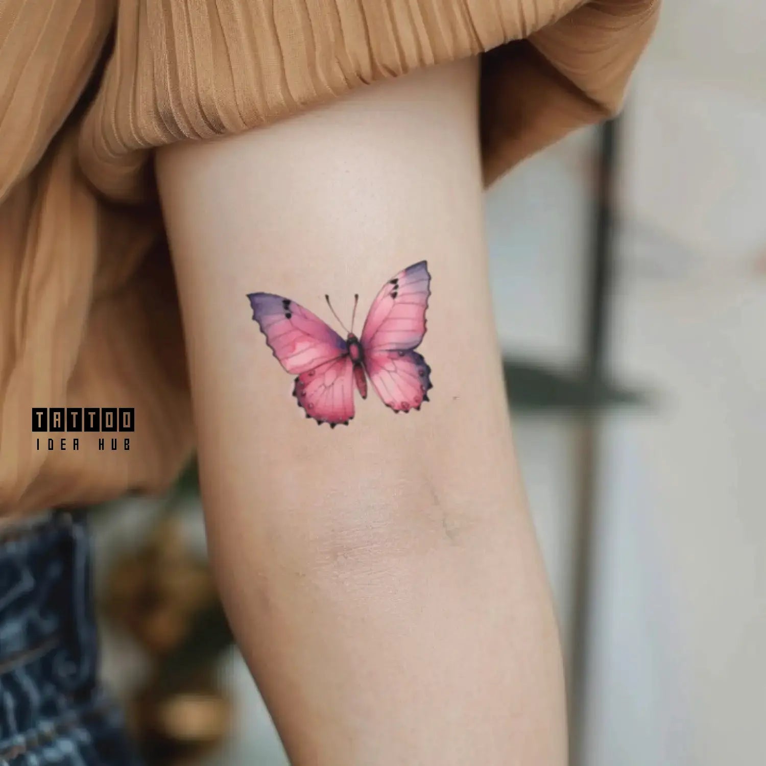 pink butterfly bicep temporary tattoo idea design