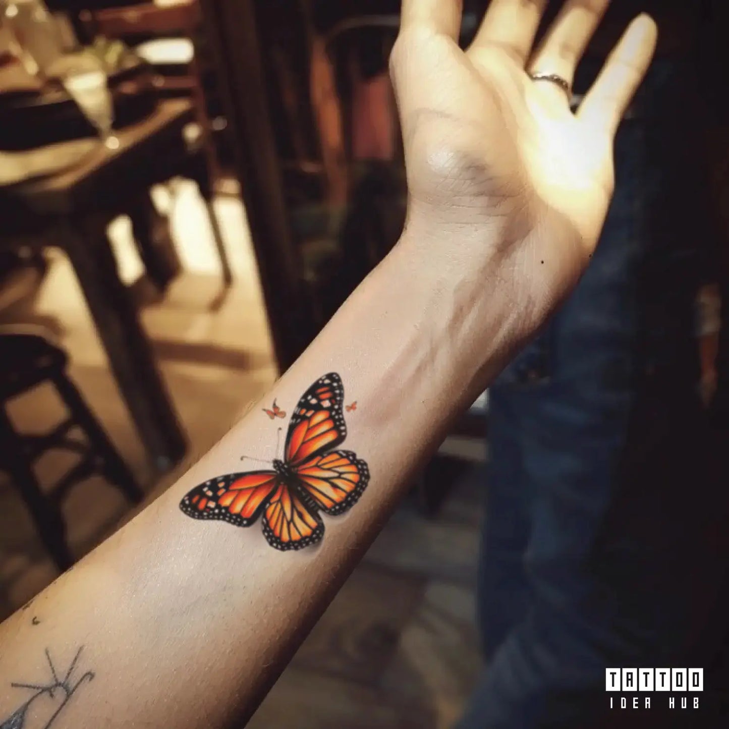 realistic butterfly forearm temporary tattoo idea design