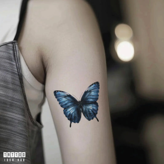 blue butterfly bicep temporary tattoo idea design