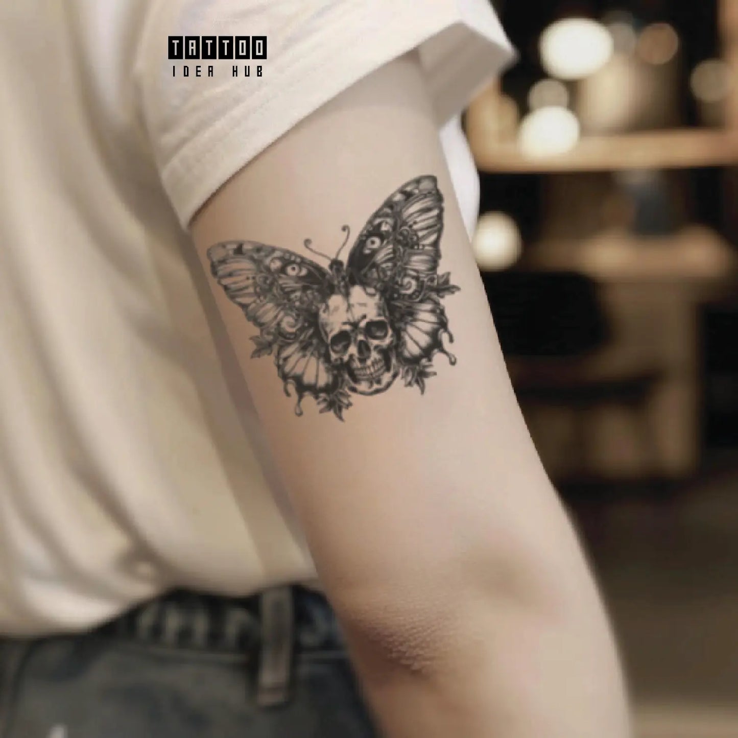 skull butterfly bicep temporary tattoo idea design