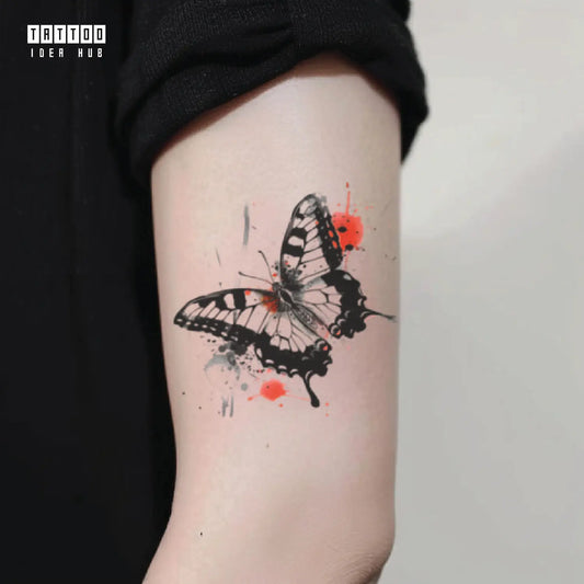 trash polka butterfly bicep temporary tattoo idea design