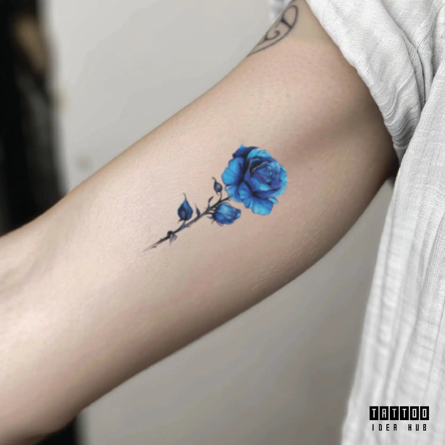 blue rose bicep temporary tattoo idea design