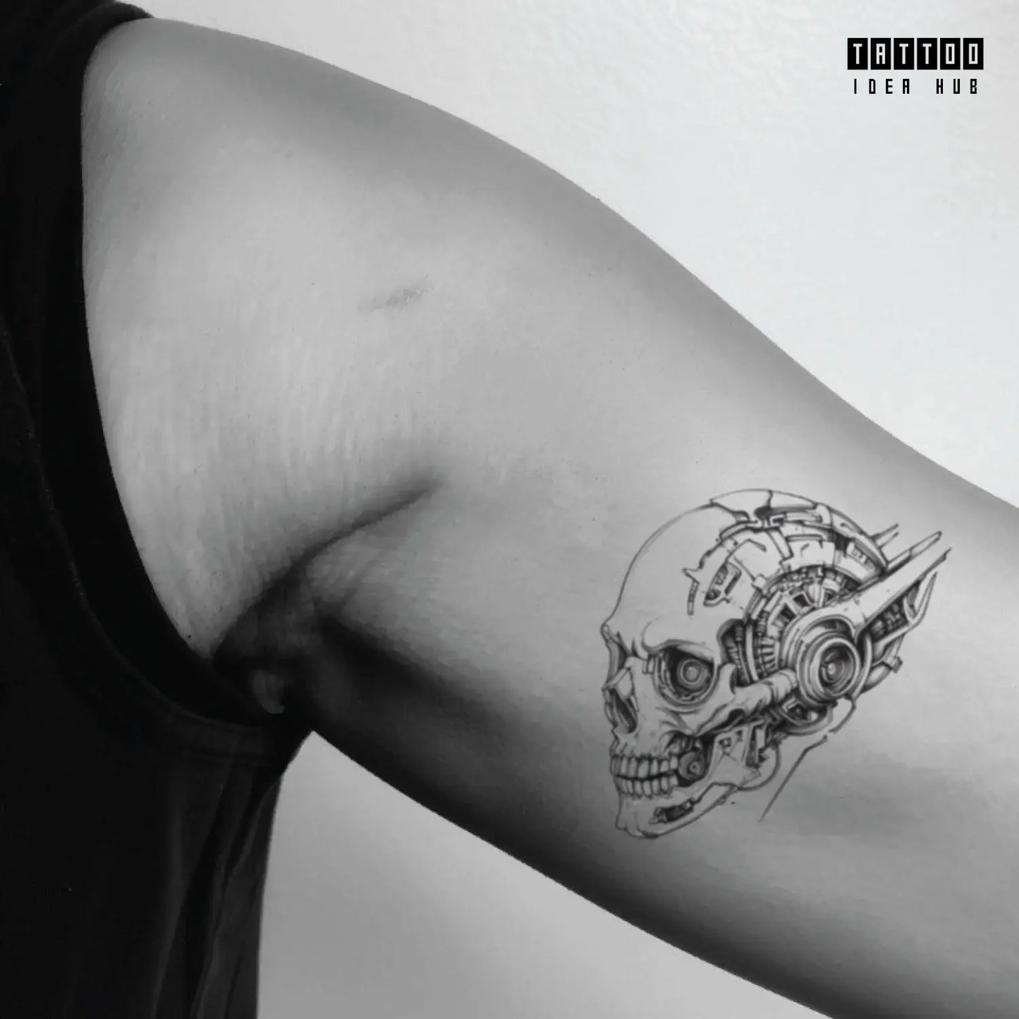 biomechanical skull bicep temporary tattoo idea design