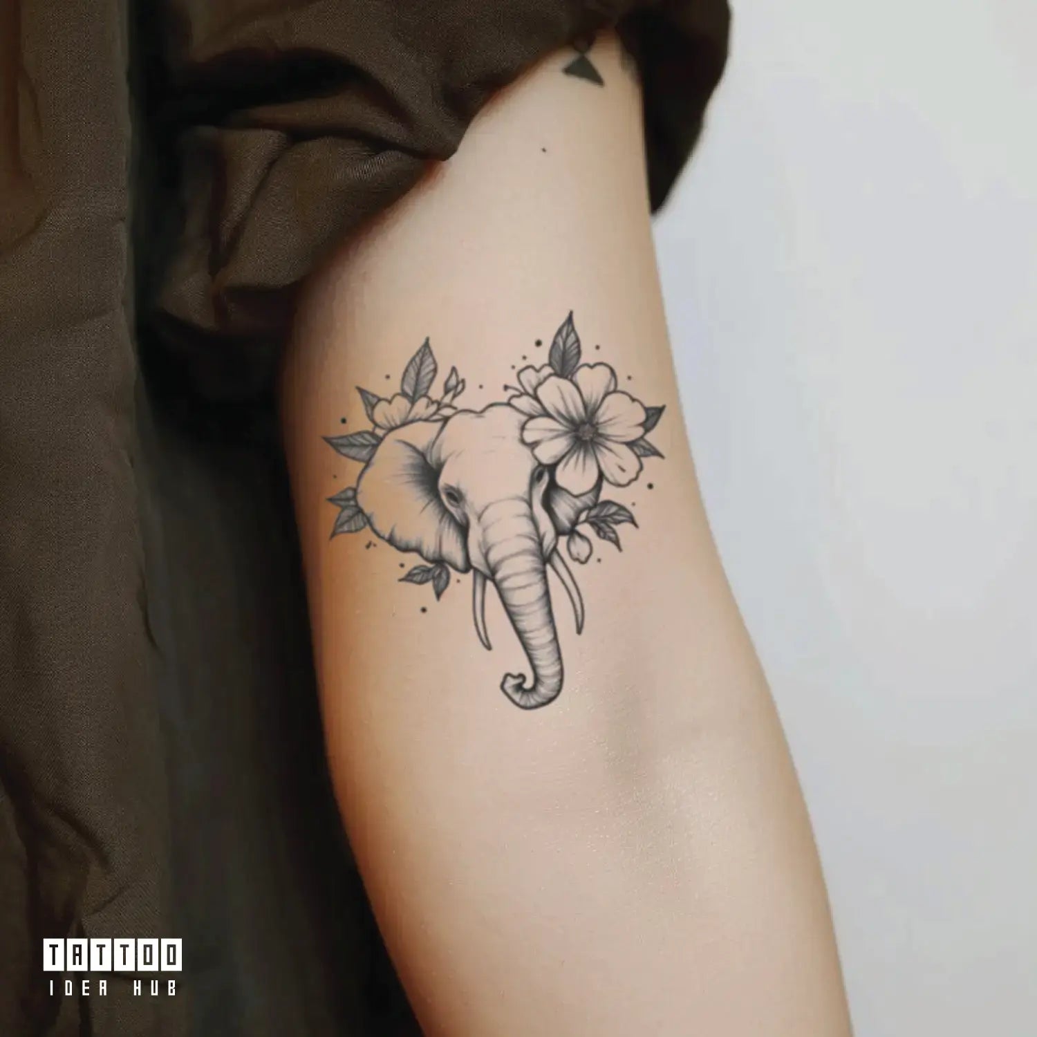 flower elephant bicep temporary tattoo idea design