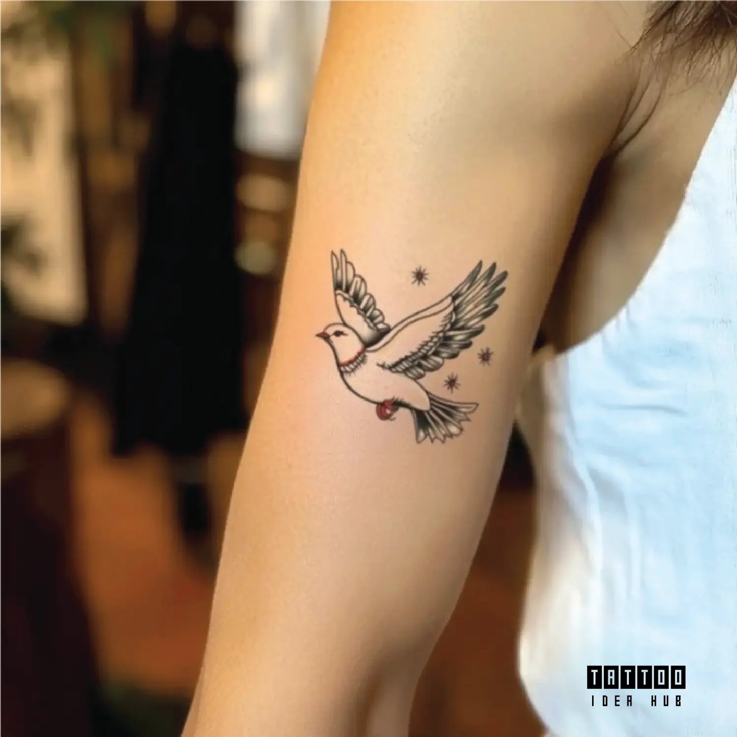 simple traditional dove outline bicep temporary tattoo idea design