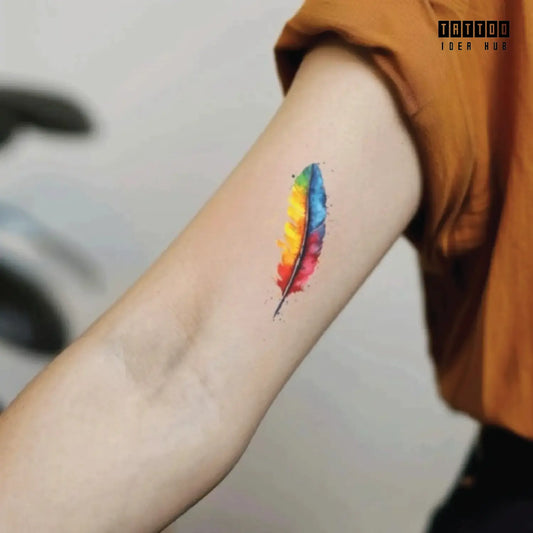 simple colorful watercolor feather bicep temporary tattoo idea design