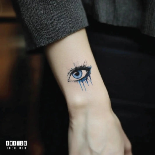 realistic blue evil eye wrist temporary tattoo idea design