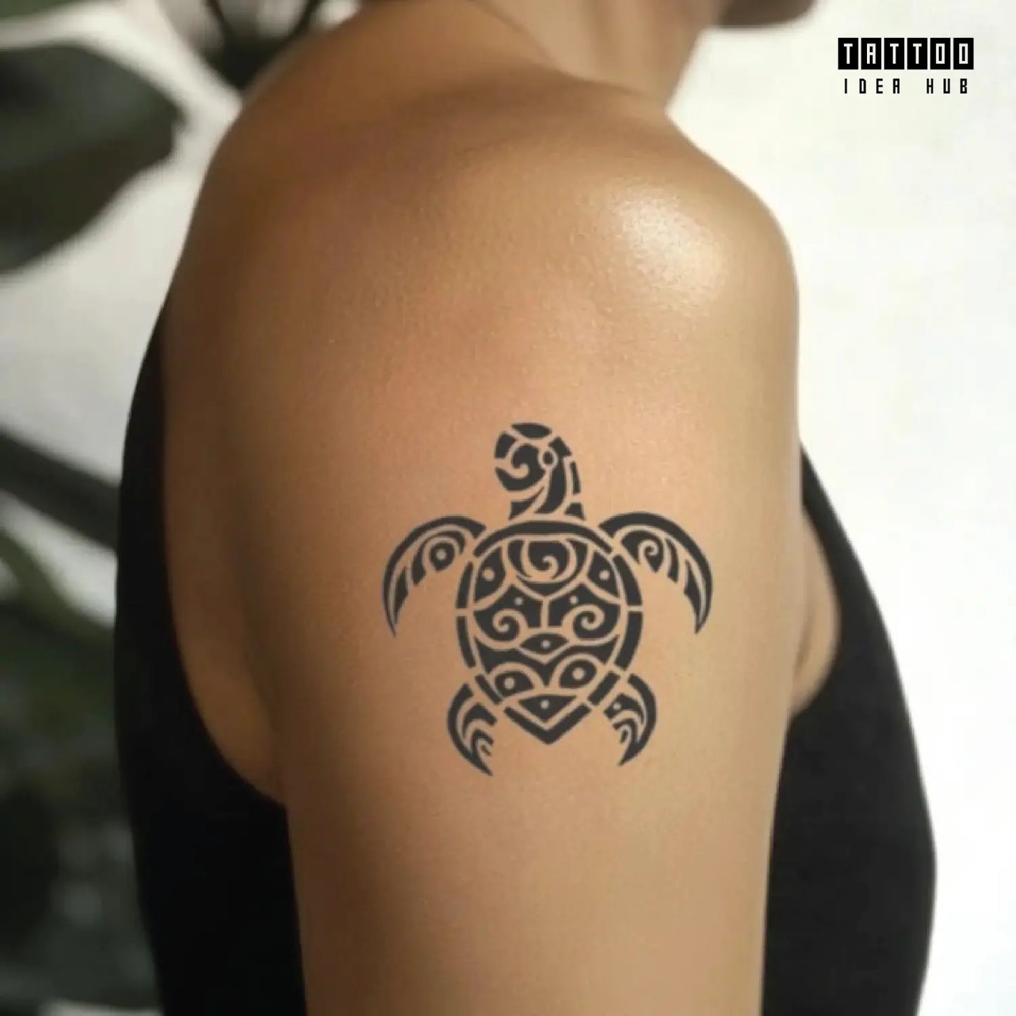 simple tribal polynesian sea turtle bicep temporary tattoo idea design