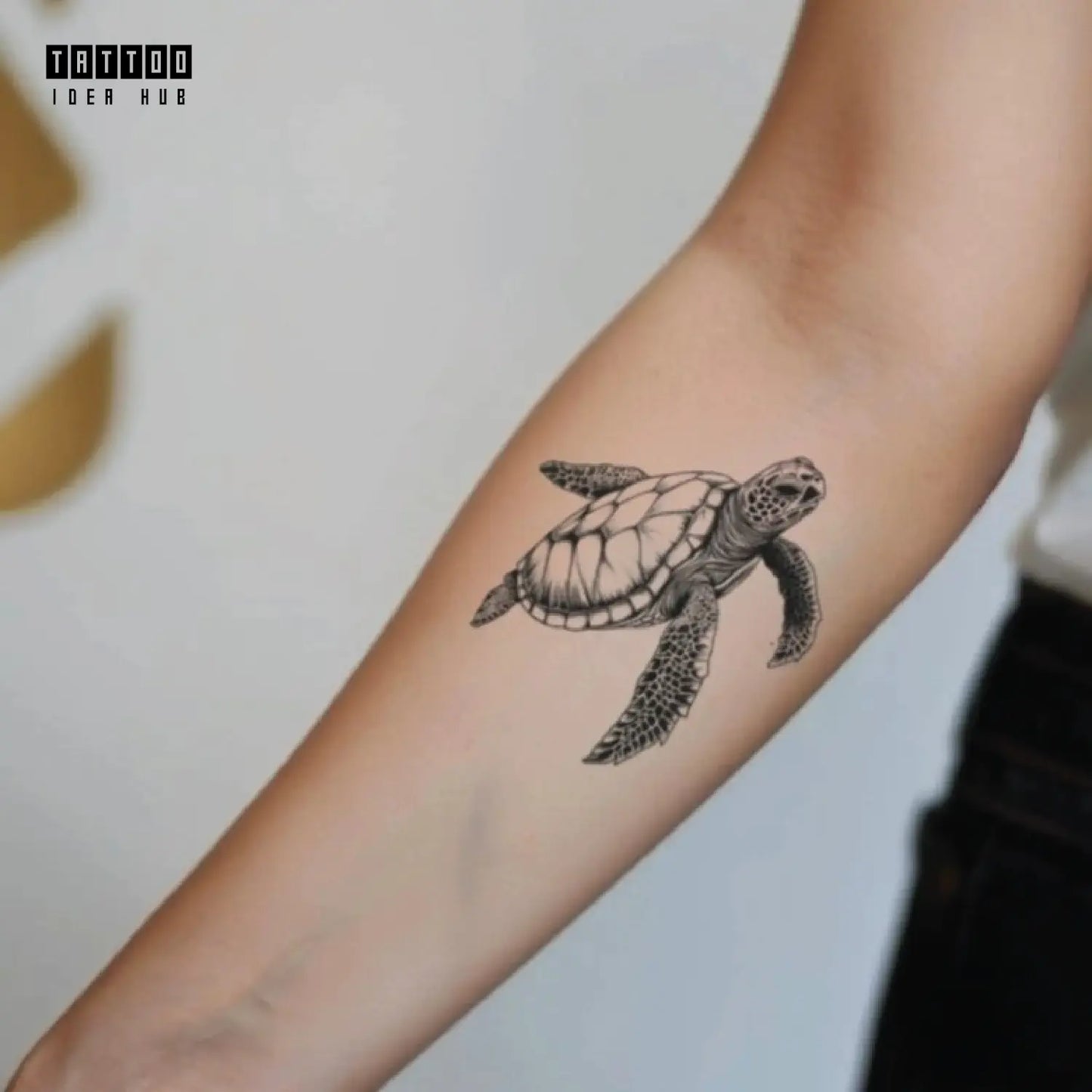 simple realistic sea turtle forearm temporary tattoo idea design