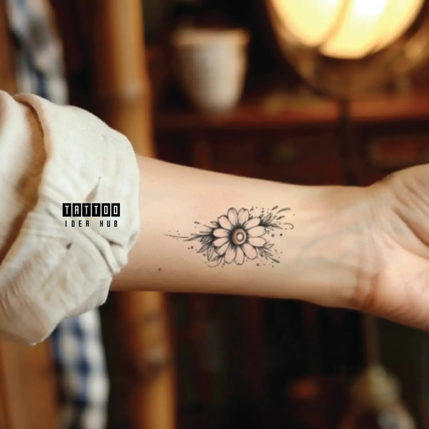 minimal daisy flower outline wrist temporary tattoo idea design