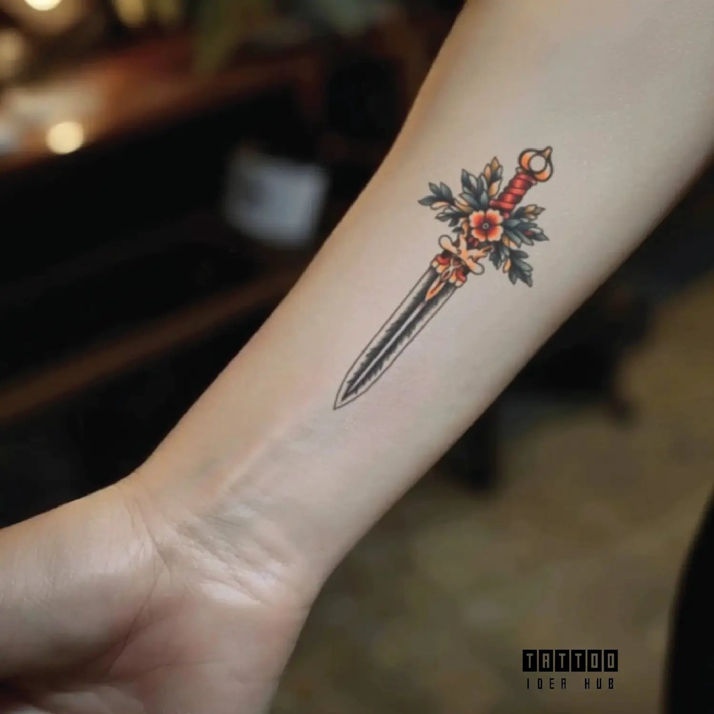 simple traditional dagger wrist temporary tattoo idea design