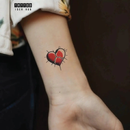 simple red broken heart outline wrist temporary tattoo idea design