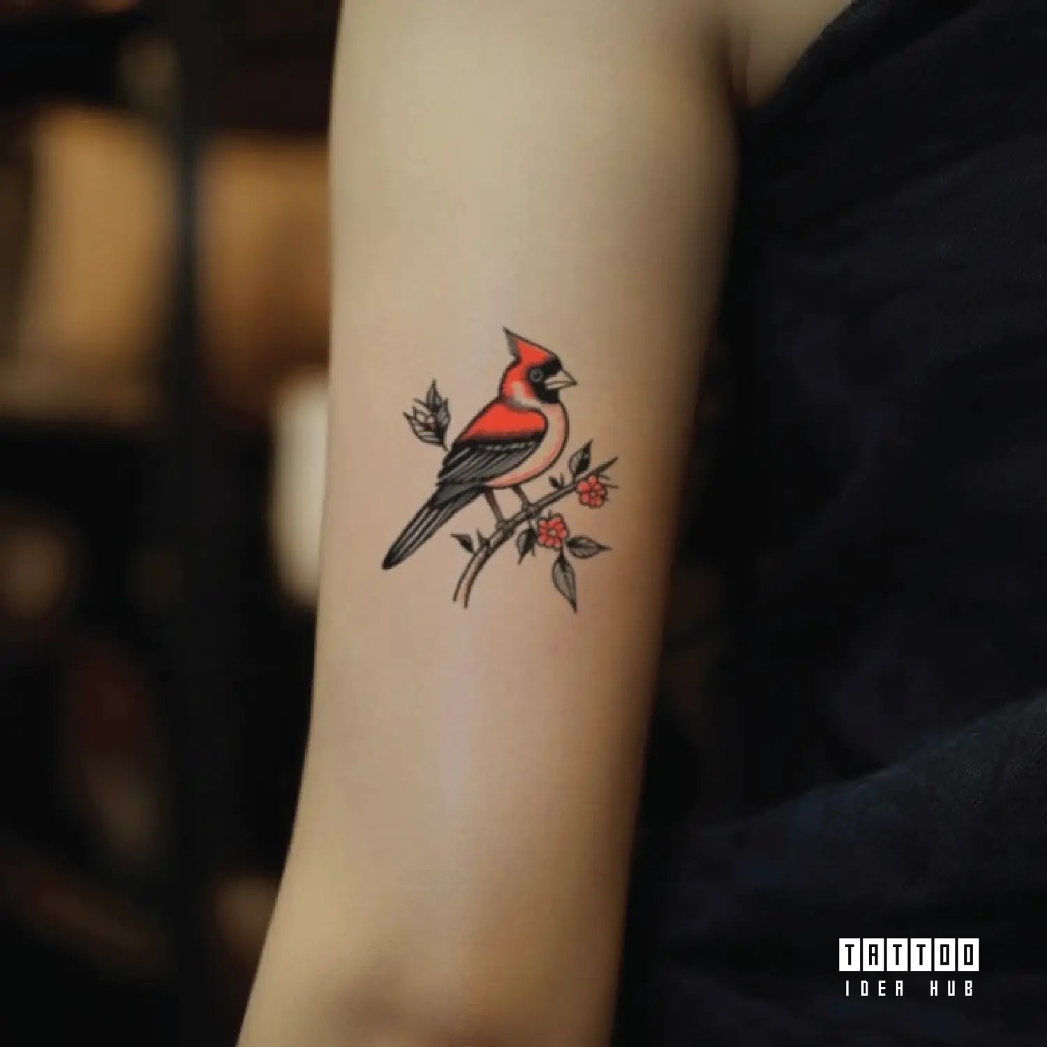 traditional red cardinal bird bicep temporary tattoo idea design