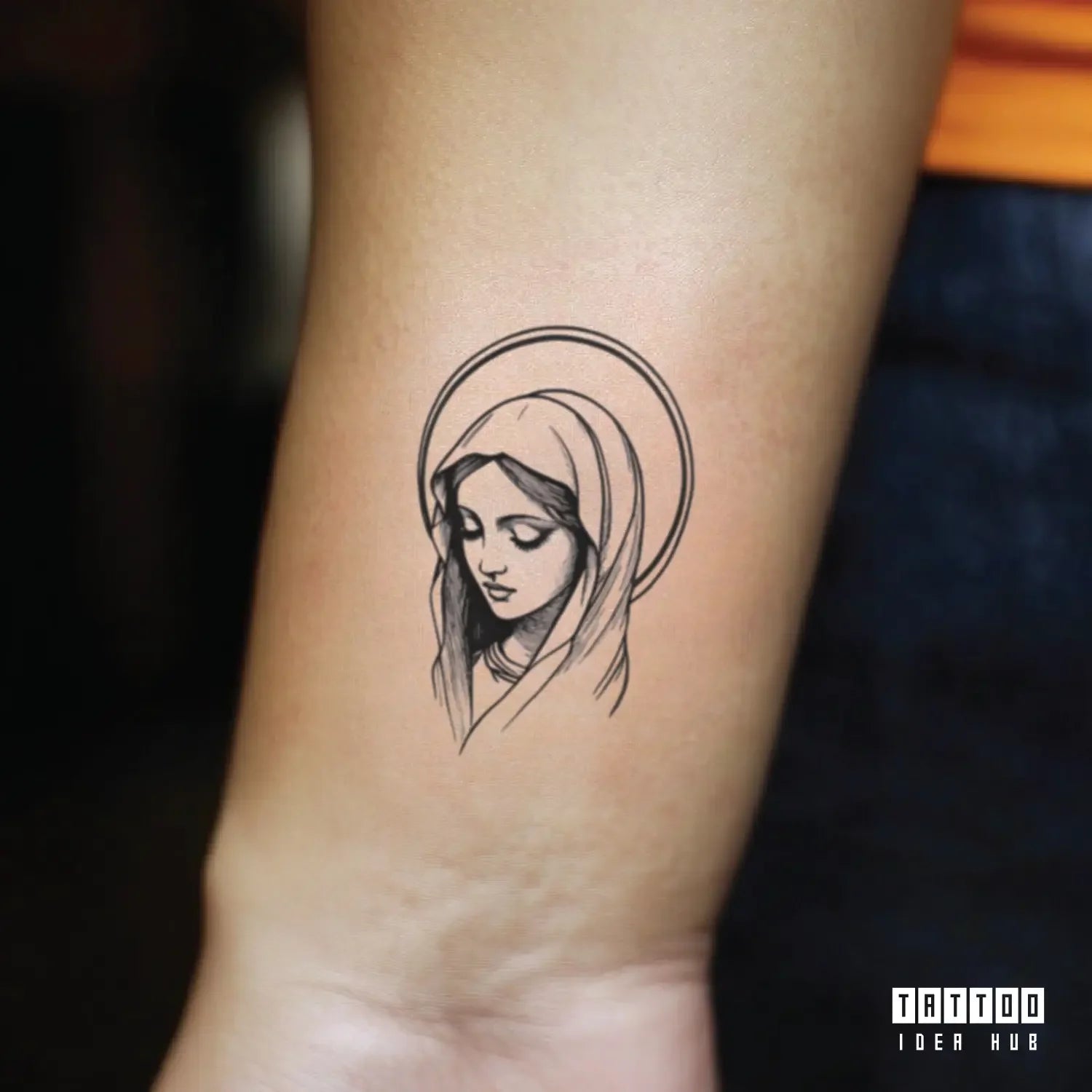 simple virgin mary outline wrist temporary tattoo idea design