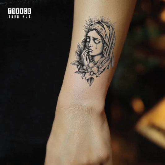 virgin mary crying forearm temporary tattoo idea design