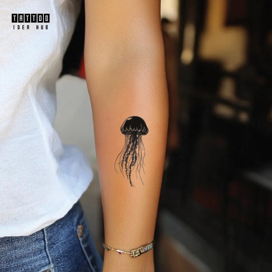 black and white jellyfish forearm temporary tattoo idea design