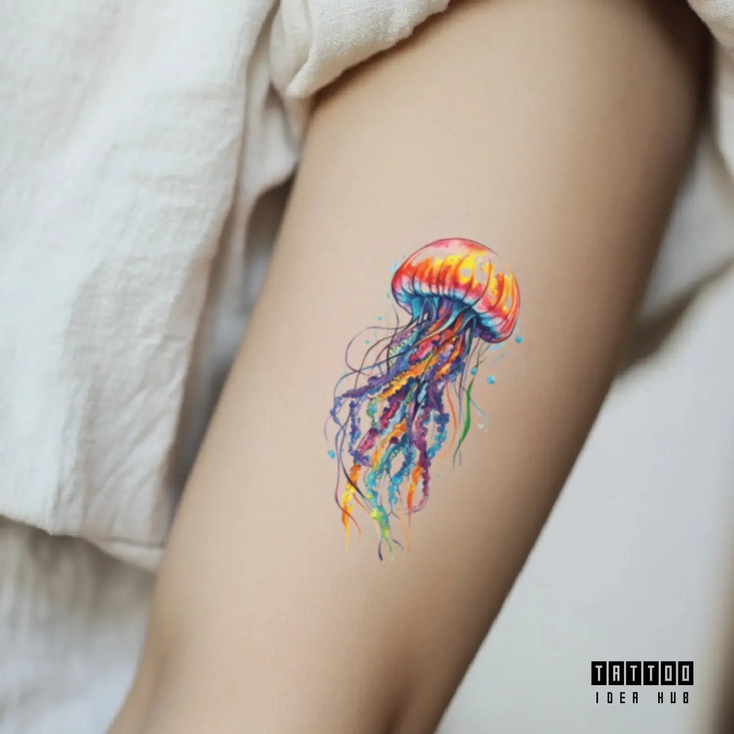 colorful jellyfish bicep temporary tattoo idea design