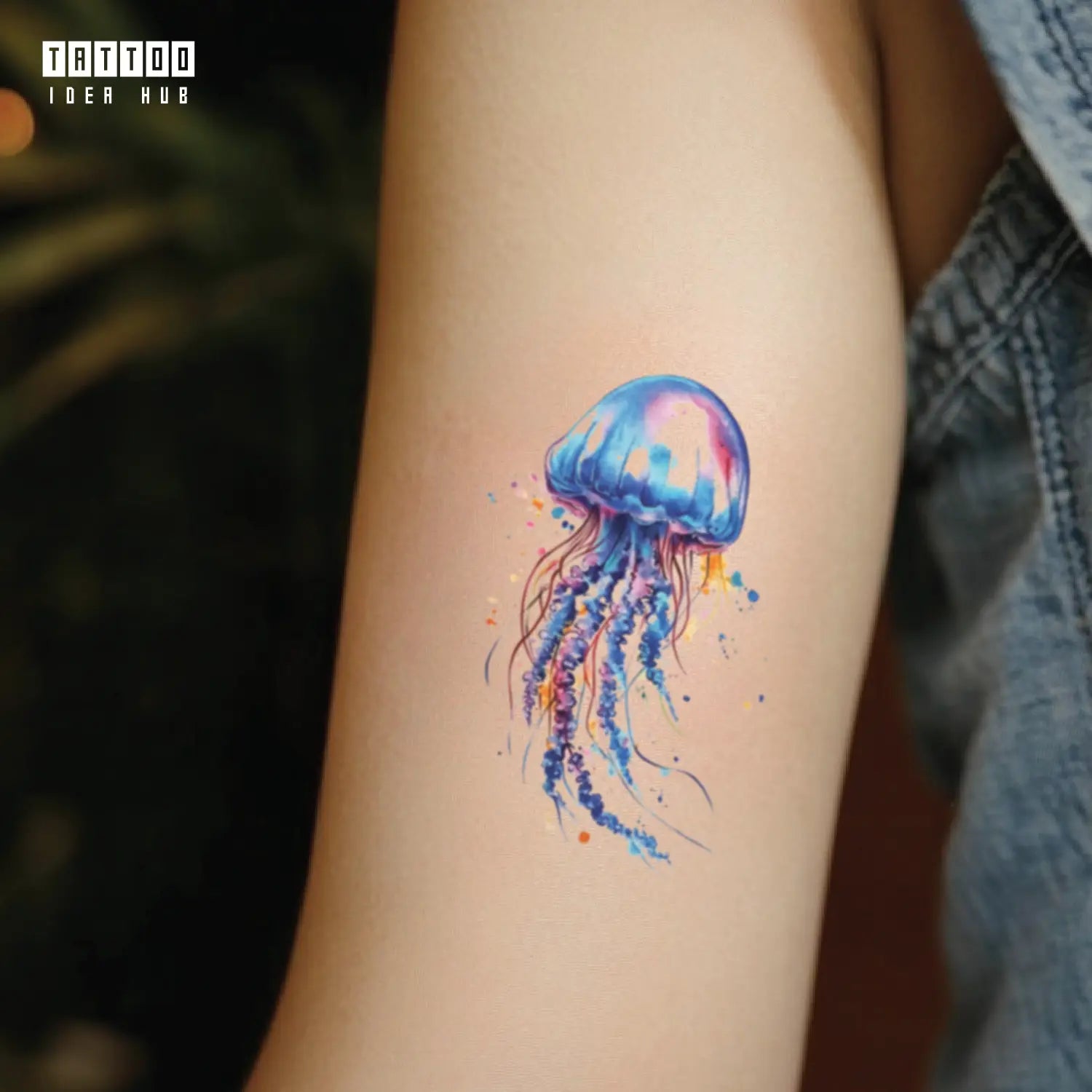 watercolor jellyfish bicep temporary tattoo idea design